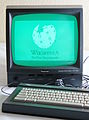 Schneider CPC6128 with green monitor GT65, Wikipedia logo.jpg